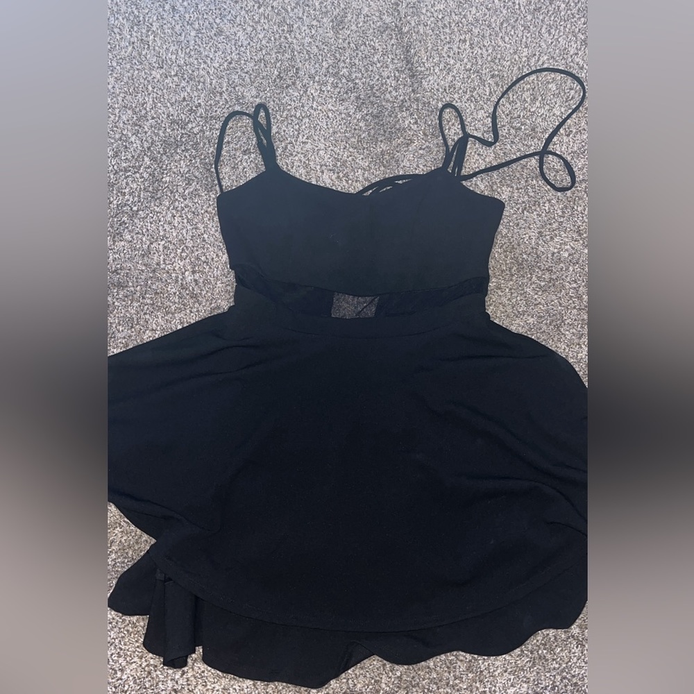 WORN ONCE Black spaghetti strapped Prom dress with a mesh patch on stomach.